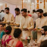 a photograph of several attentive waiter cn3ytsmlsxkhg8mmykg 4a 6ugaiiczs4uw4yw0y60o0g